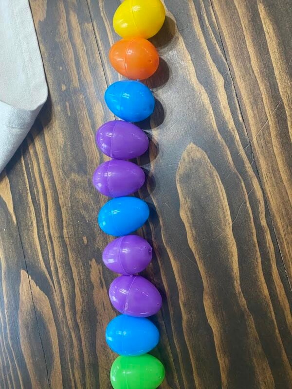 line of Easter eggs on a table